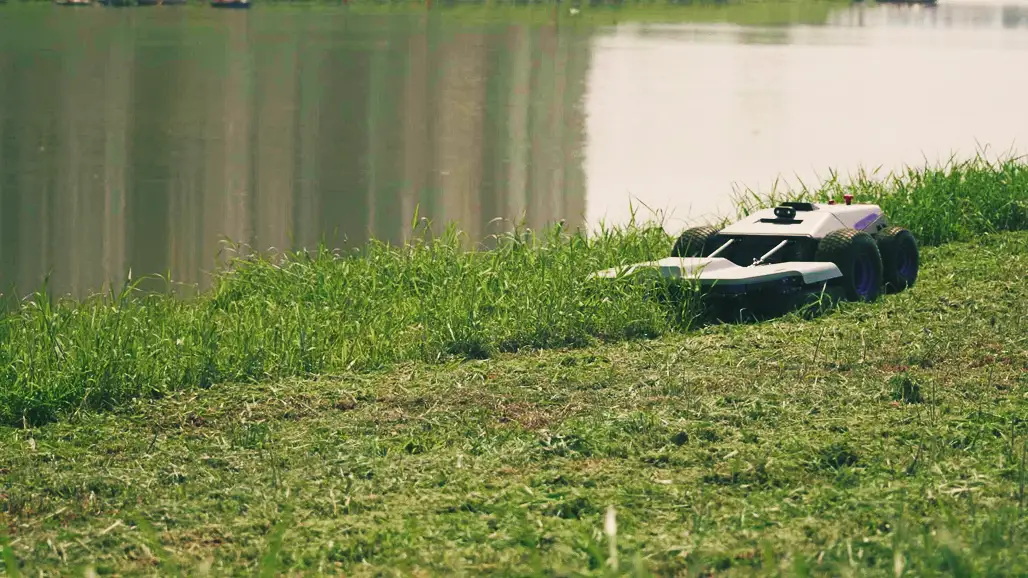 PANDAG lawn mower operates along the river